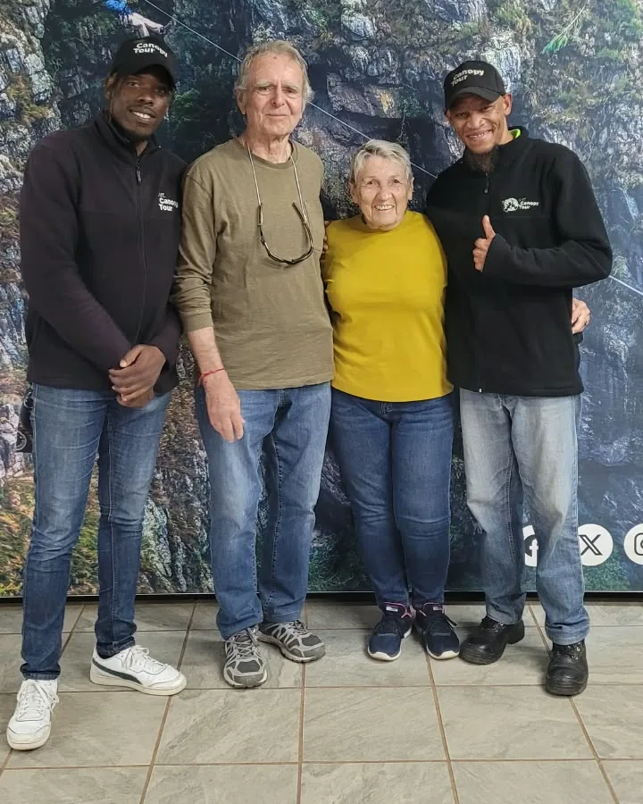 Johann and Edeltraud, both 83, standing with Cape Canopy Tour guides Ronnie and Limi after their tour